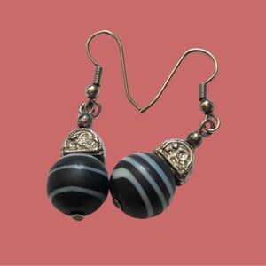 Vintage-style swirled satin black & white glass & silvertone dangle earrings